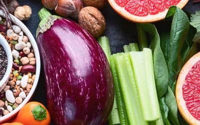 What barriers do women face to implementing a heart-healthy diet?