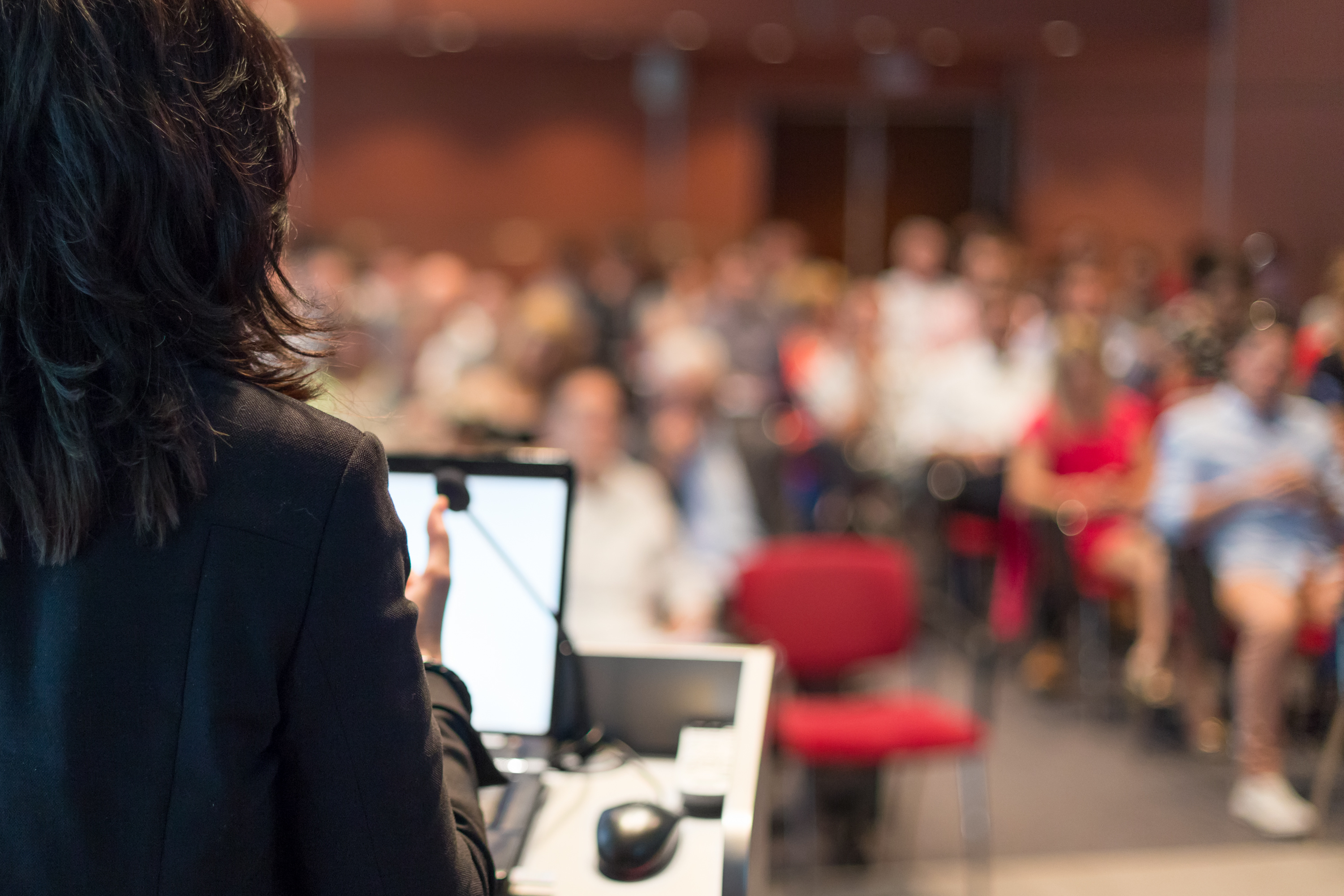 Woman at podium.jpg (1.59 MB)